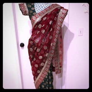 Red and green colored saree